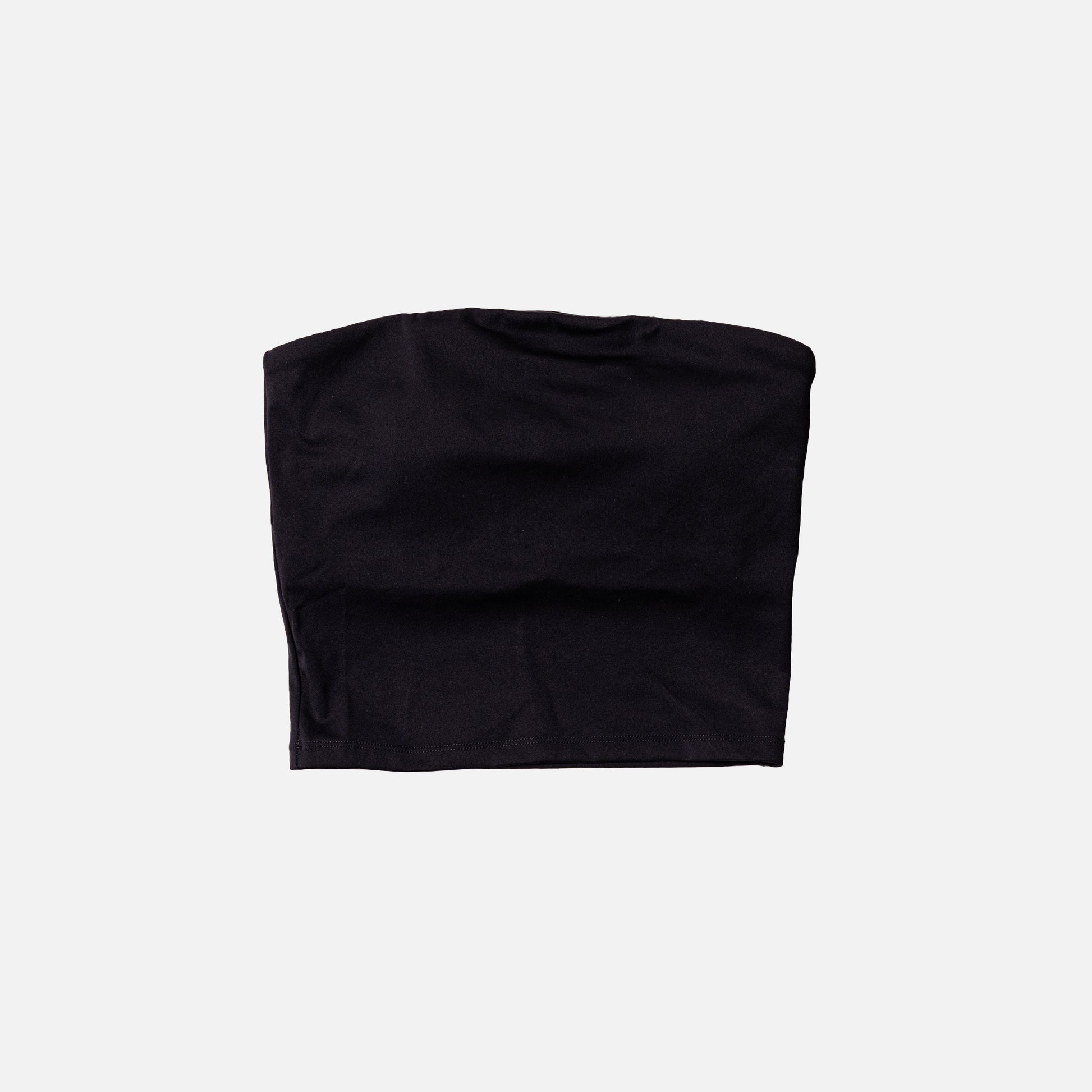 Black tube top activewear on a light gray background