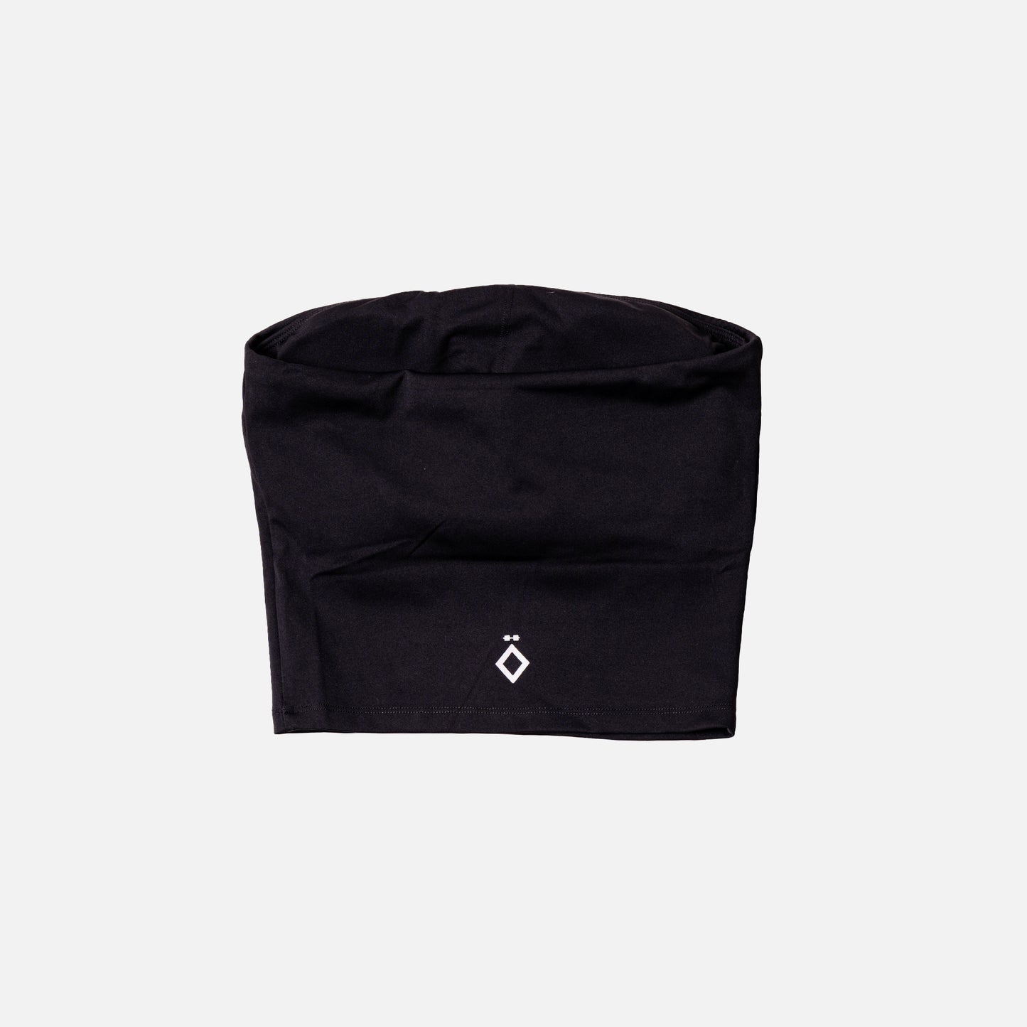 Black top for workout with a logo on a light gray background