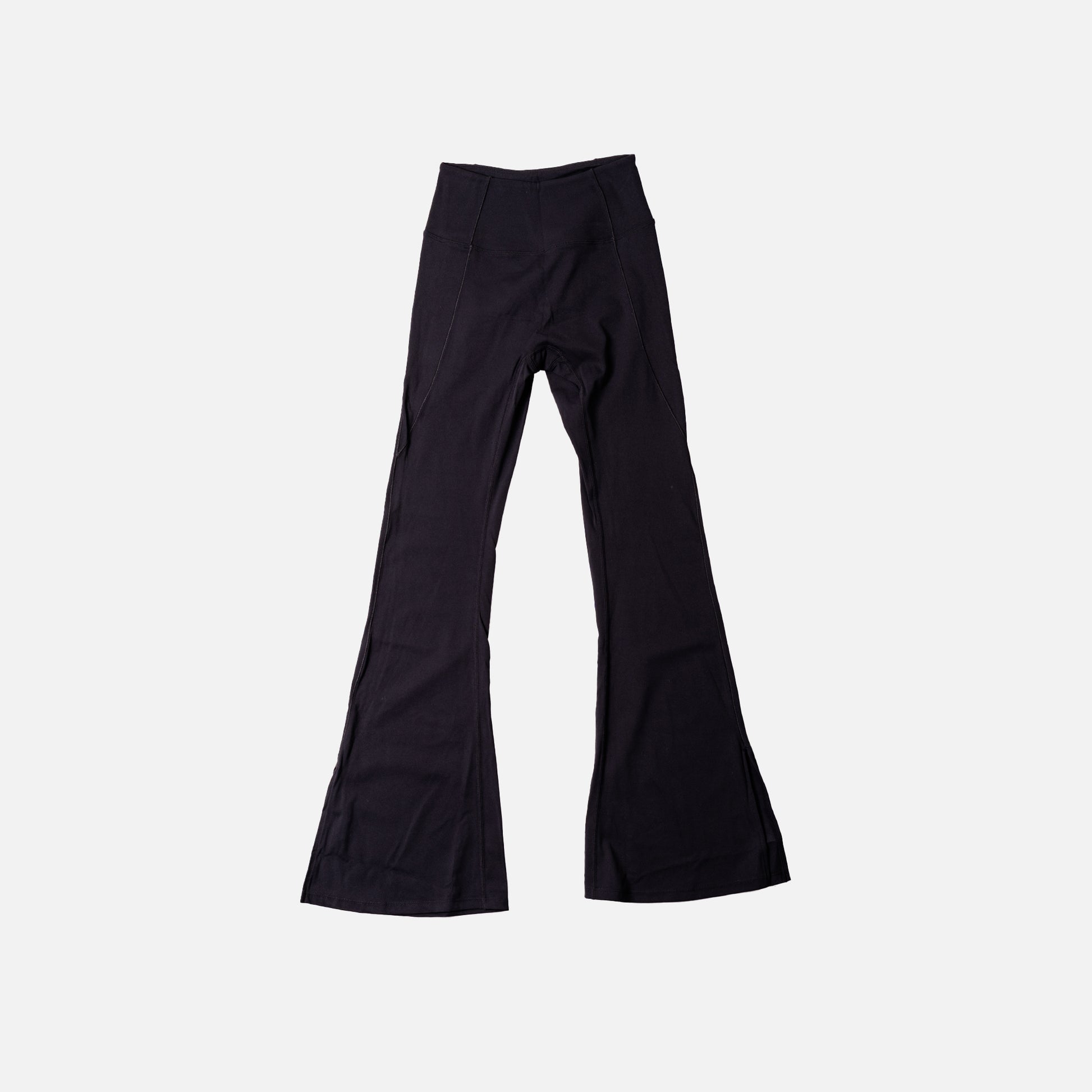Black flare leggings on a light gray background