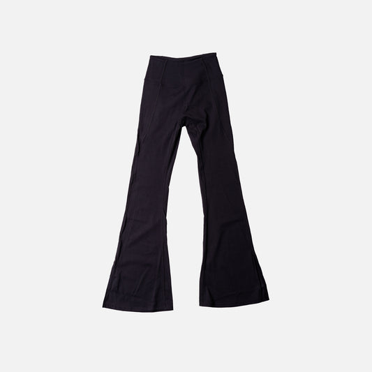 Black flare leggings on a light gray background