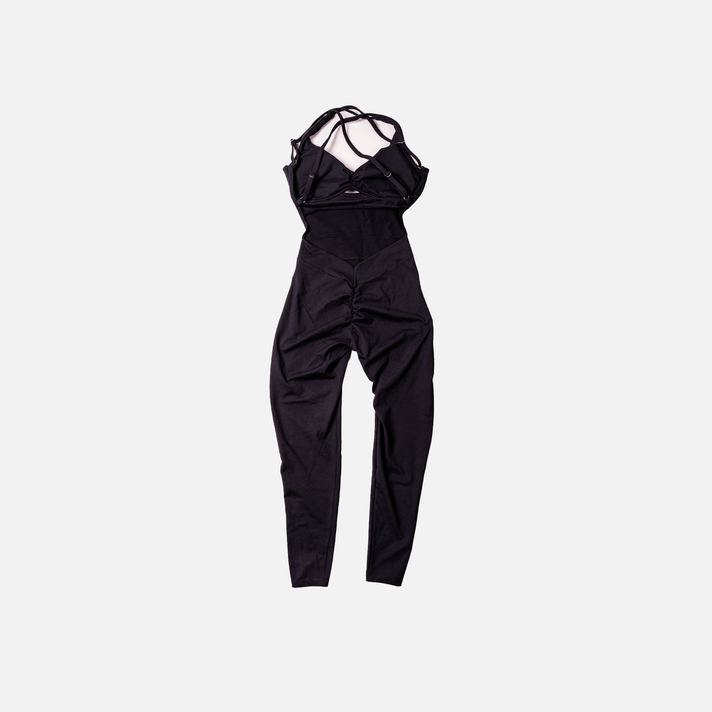 Black jumpsuit on a light gray background