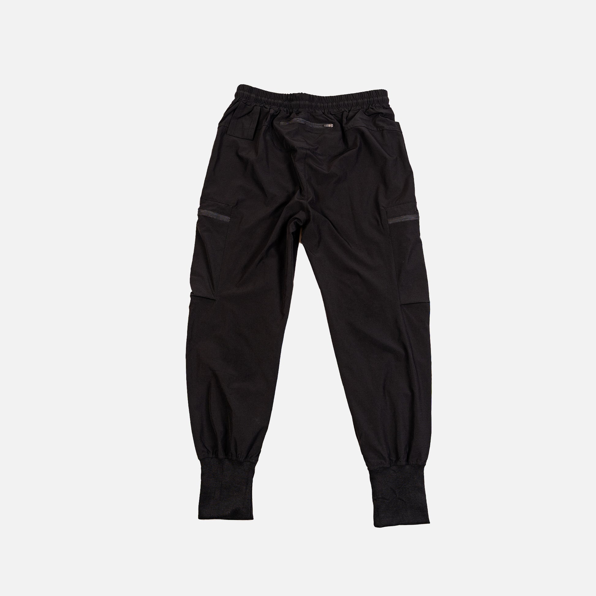 Black pants on a light gray background