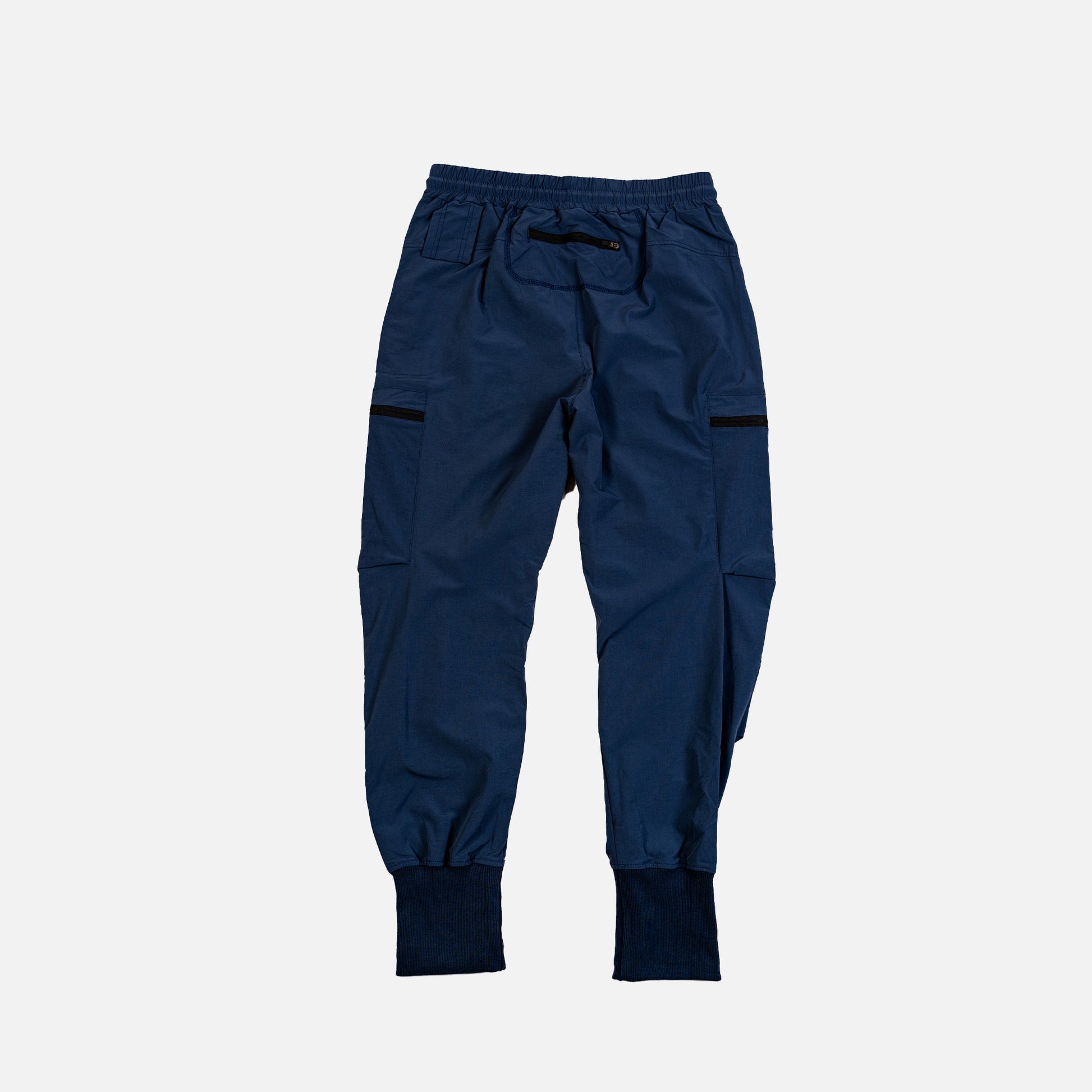 Navy blue pants on a light gray background